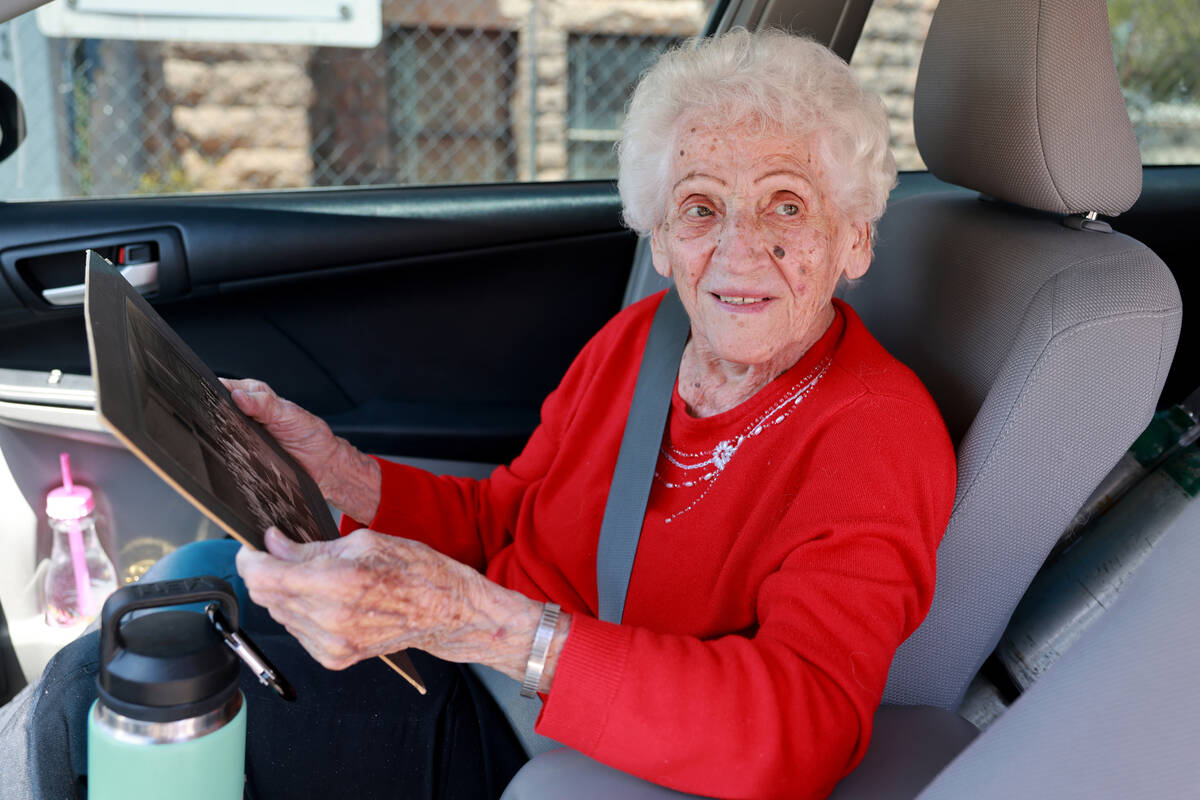 Helen McLeod, who was born and raised in the former boomtown of Goldfield, talks to a reporter ...