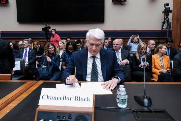 Dr. Gene Block, Chancellor, University of California, Los Angeles, arrives at a hearing called ...