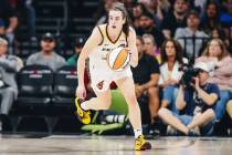 Indiana Fever guard Caitlin Clark (22) dribbles the ball during a game between the Aces and Ind ...