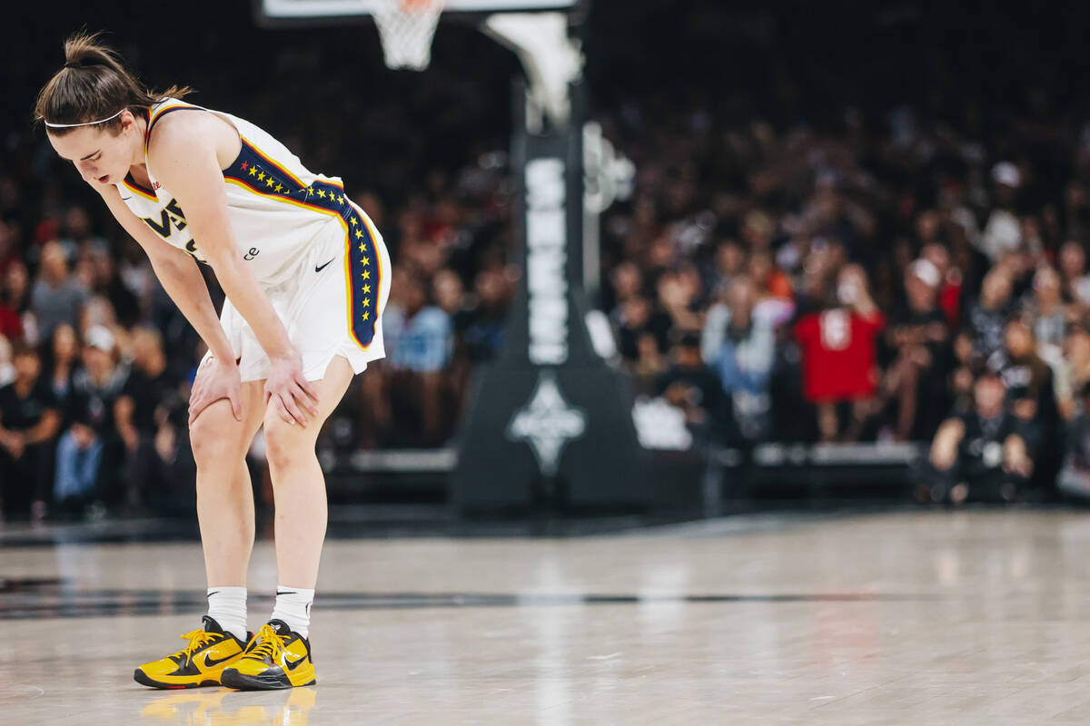 Indiana Fever guard Caitlin Clark (22) looks to the ground as the Indiana Fever trail the Aces ...