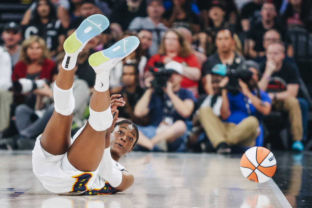 Indiana Fever center Temi Fagbenle (14) looks at the referee after being fouled during a game b ...