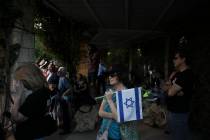 Israelis attend the funeral of Hanan Yablonka, who was killed during Hamas' Oct. 7, 2023 attack ...
