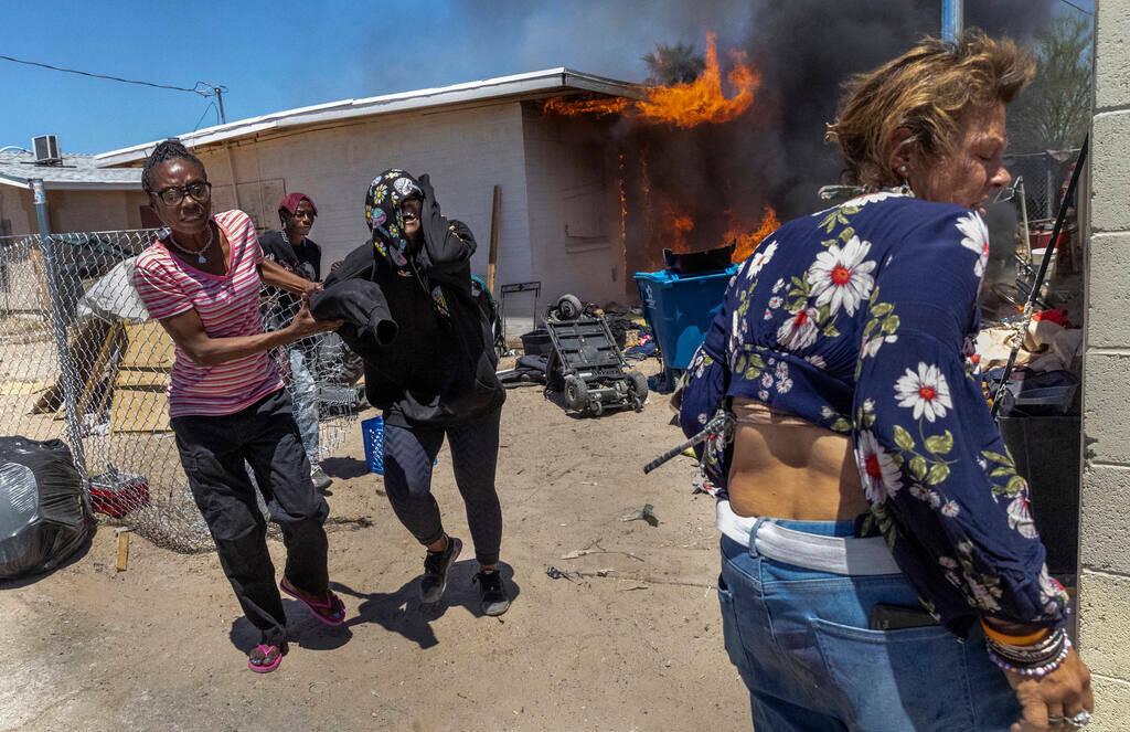 People run from a house fire after all got out alive between W. Jefferson Ave. and W. Adams Ave ...