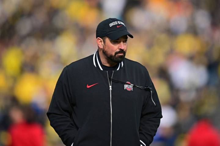 Ohio State head coach Ryan Day walks before a NCAA college football game against Michigan, Satu ...