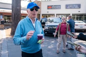 President Joe Biden speaks with reporters after taking a pilates and spin class at PeloDog, Wed ...