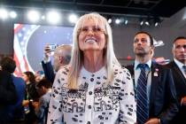 FILE - Miriam Adelson listens as President Donald Trump speaks at the Israeli American Council ...