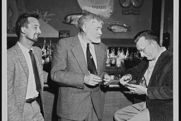 Ernest Hemingway, center, talks with Las Vegas Review-Journal staff writer Colin McKinlay, righ ...