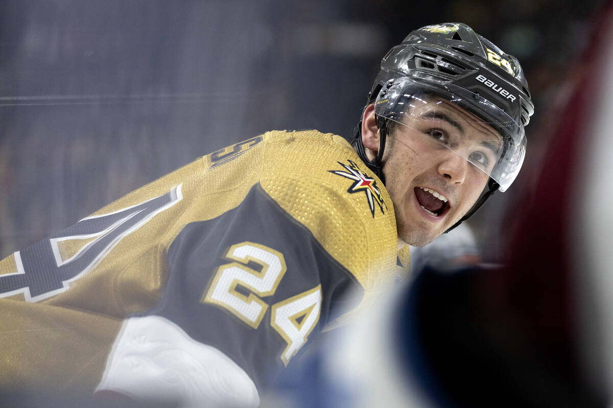 Golden Knights center Brendan Brisson (24) chirps an Avalanche player during the third period o ...