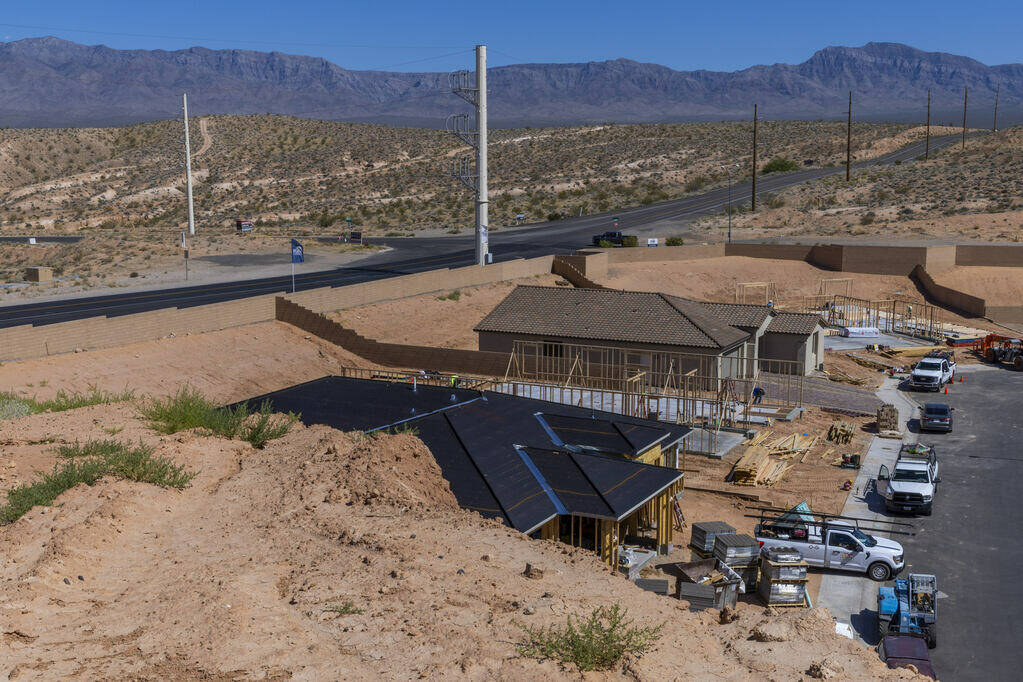 Newer homes are soon joined by others under construction in the Suntero project as housing cons ...
