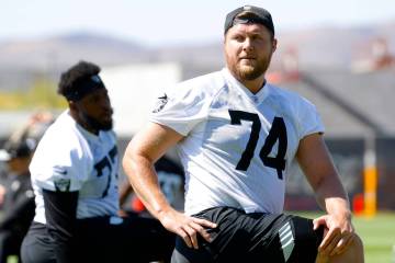 Raiders offensive tackle Kolton Miller (74) stretches during team's practice at the Intermounta ...