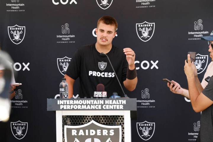 Raiders quarterback Aiden O'Connell (12) addresses the media after organized team activities at ...