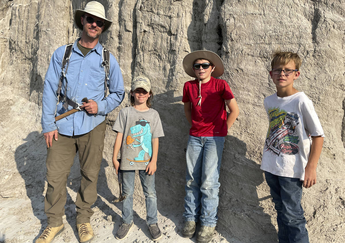 In this photo provided by Giant Screen Films, vertebrate paleontologist Tyler Lyson, left, pose ...