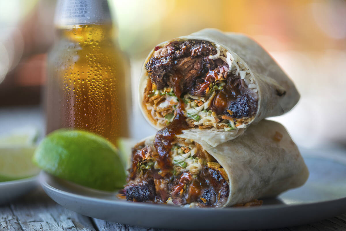 A burnt ends burrito from BBQ Mexicana is being served for the summer 2024 season at Las Vegas ...
