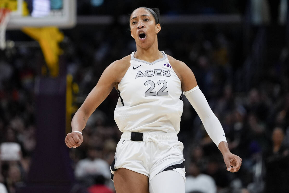 Las Vegas Aces center A'ja Wilson reacts after scoring during the first half of a WNBA basketba ...