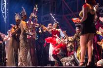 Ms. B LaRose, of Chicago, left, celebrates with friends after being named M- Exotic World in th ...
