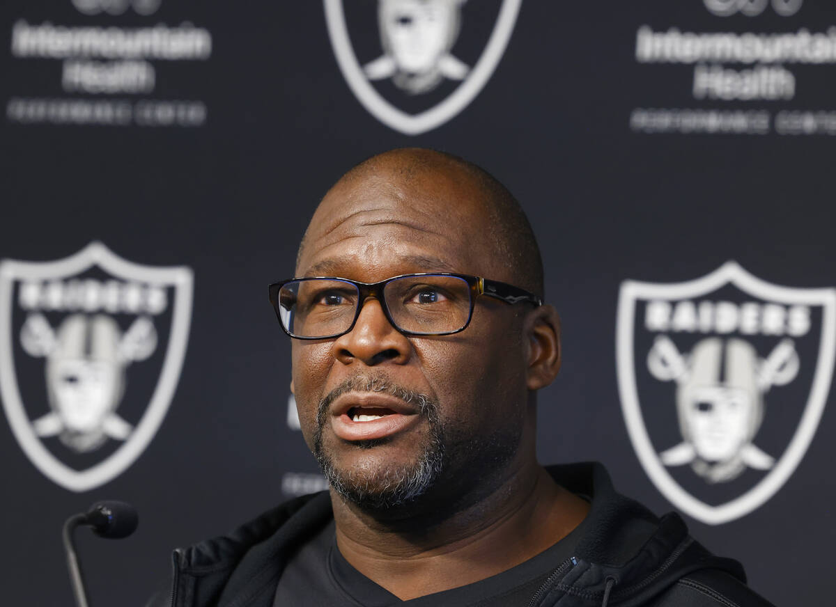 Raiders wide receivers coach Edgar Bennett addresses the media before an NFL football practice ...