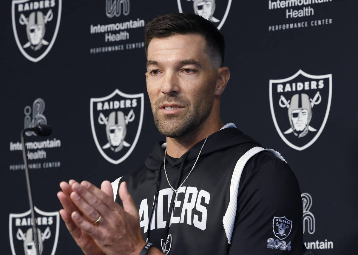 Raiders defensive line coach Rob Leonard addresses the media before an NFL football practice at ...