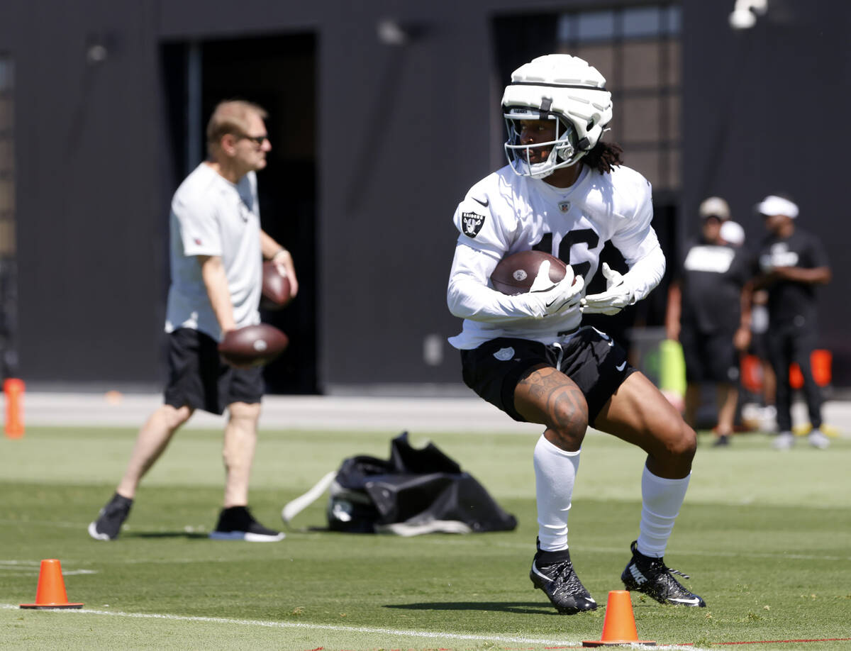 Raiders wide receiver Jakobi Meyers (16) runs through drills during an NFL football practice at ...