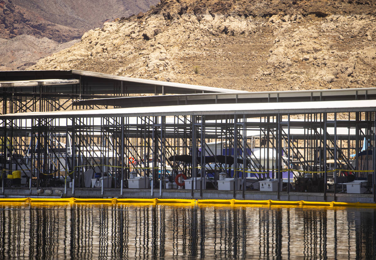 The scene where a fire at the Las Vegas Boat Harbor destroyed boats after midnight on Sunday is ...