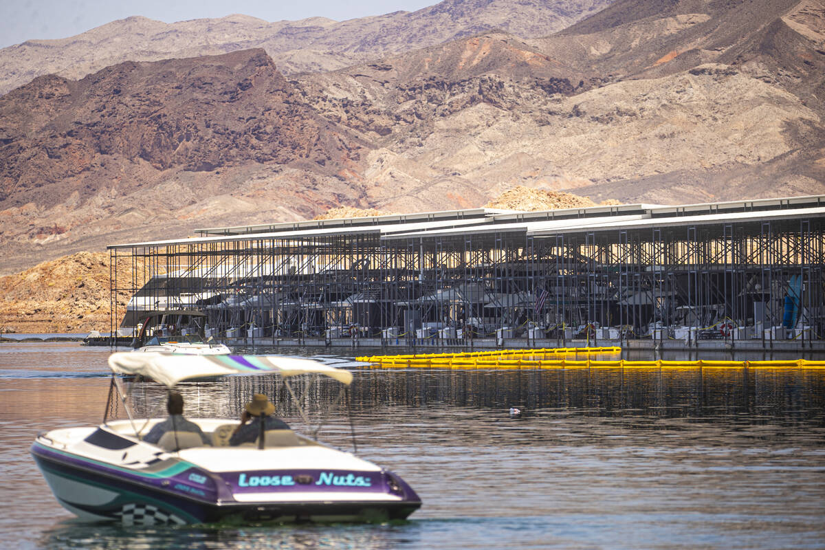 The scene where a fire at the Las Vegas Boat Harbor destroyed over a dozen boats after midnight ...
