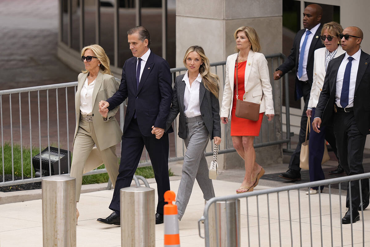 Hunter Biden, President Joe Biden's son, accompanied by his mother, first lady Jill Biden and h ...