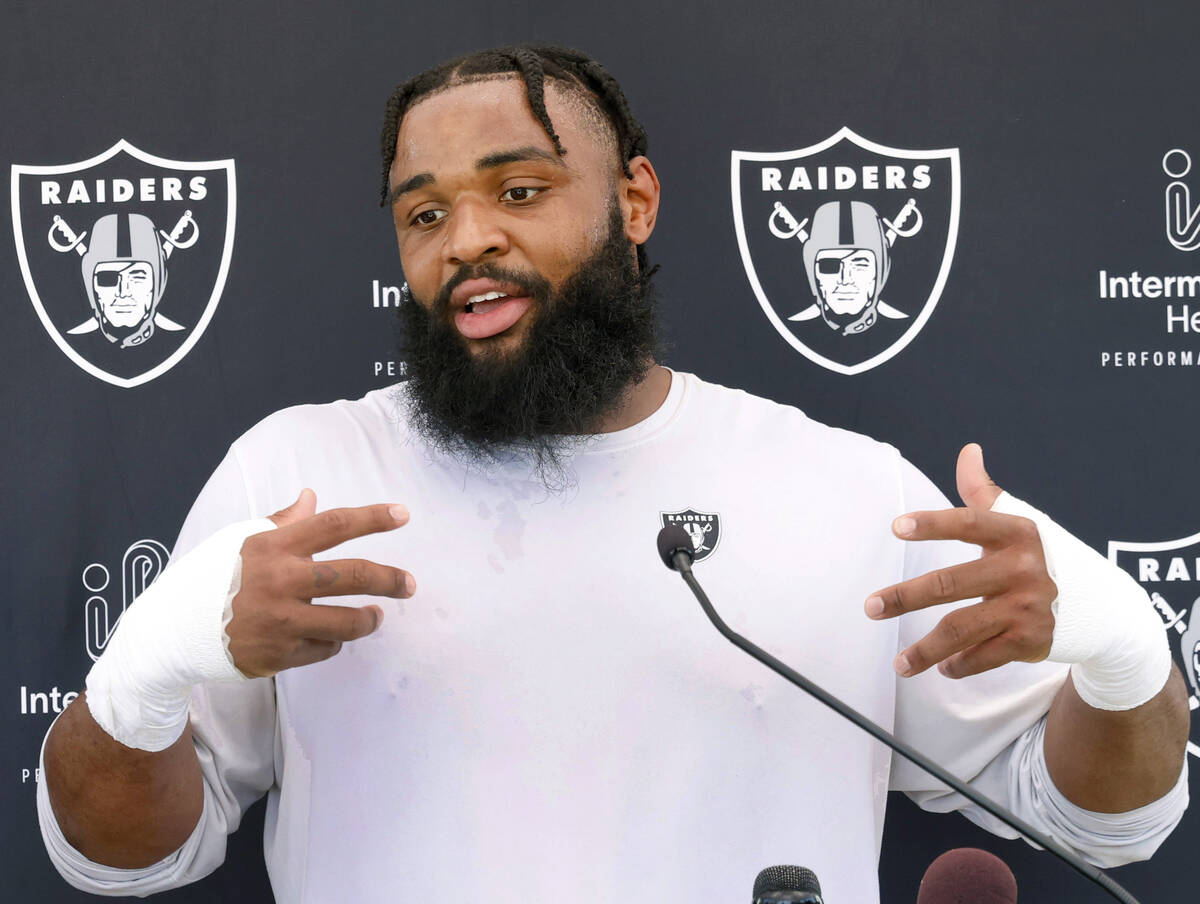 Raiders defensive tackle Christian Wilkins addresses the media after an NFL football practice a ...