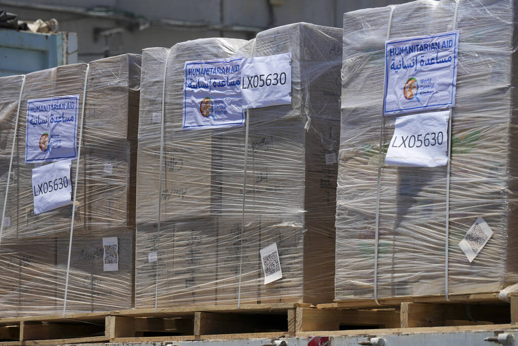 A bundle of humanitarian aid for the Gaza Strip with the logo of World Central Kitchen (WCK) is ...