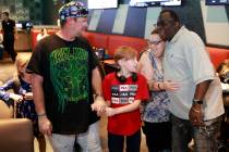 The recently reunified Melius family, from left, Zoey, 8, dad Bernard IV, mom Elizabeth and Vik ...