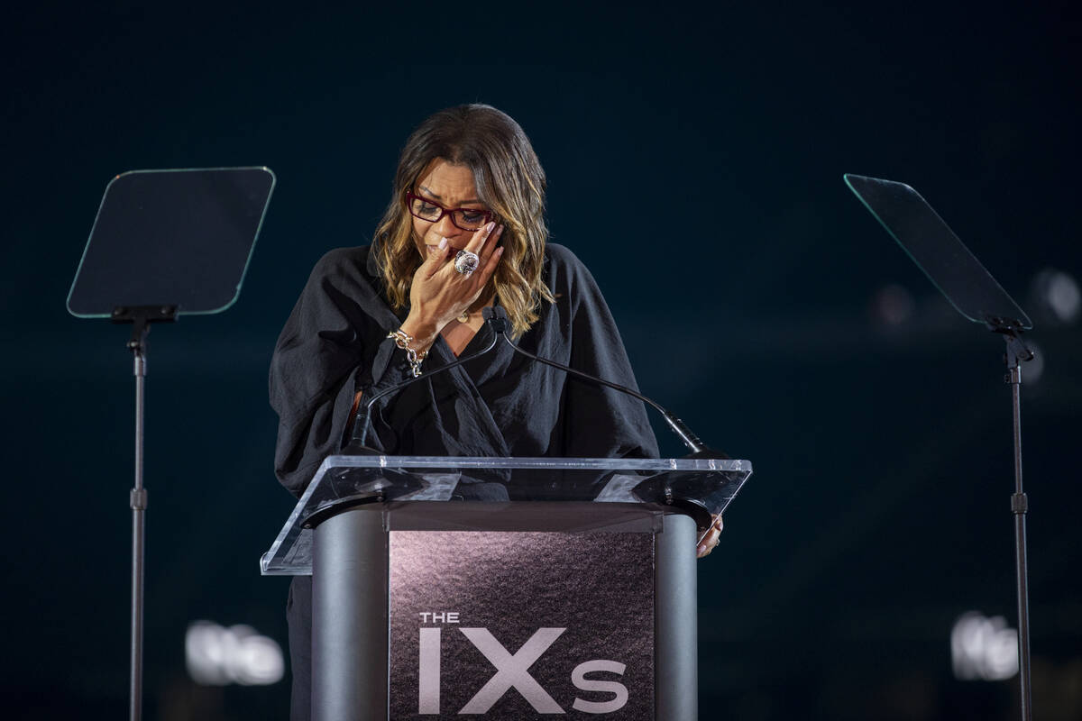 Nikki Fargas, President of the Las Vegas Aces, becomes emotional while speaking during The IX A ...