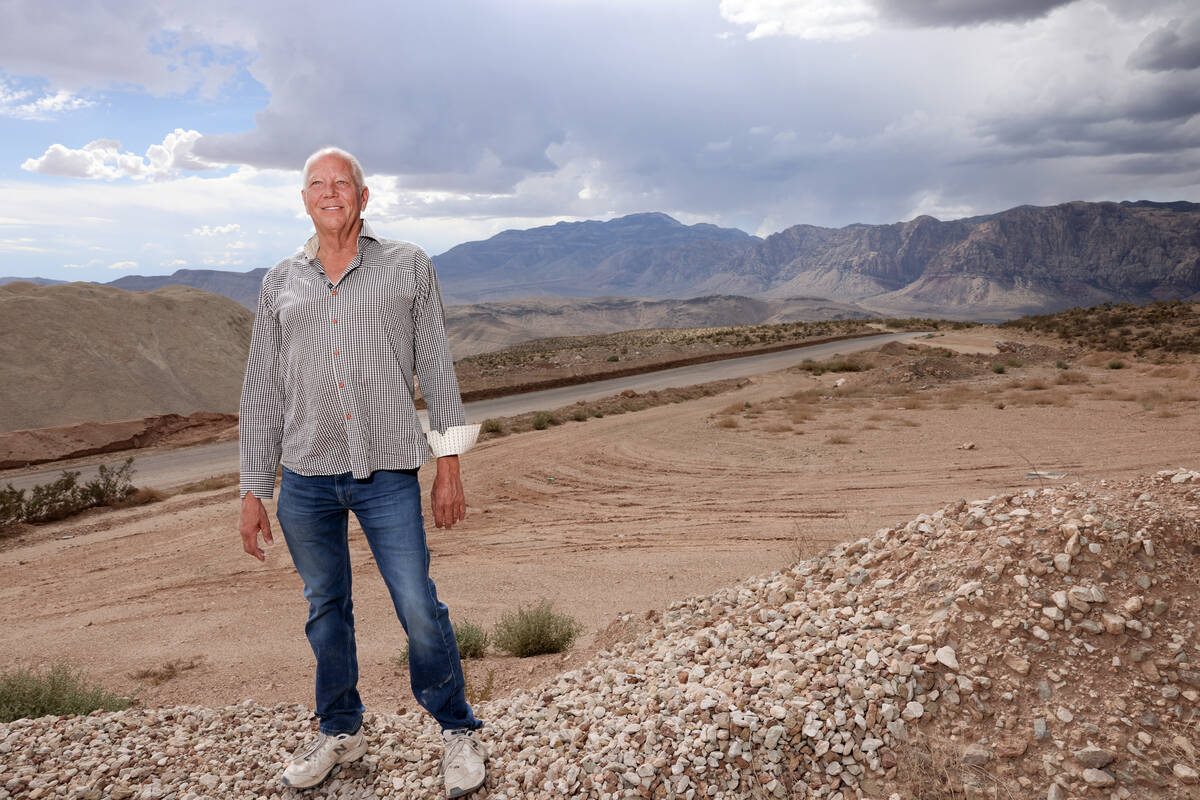 Developer Jim Rhodes stands where he hopes to build 400 single-family homes at his Blue Diamond ...