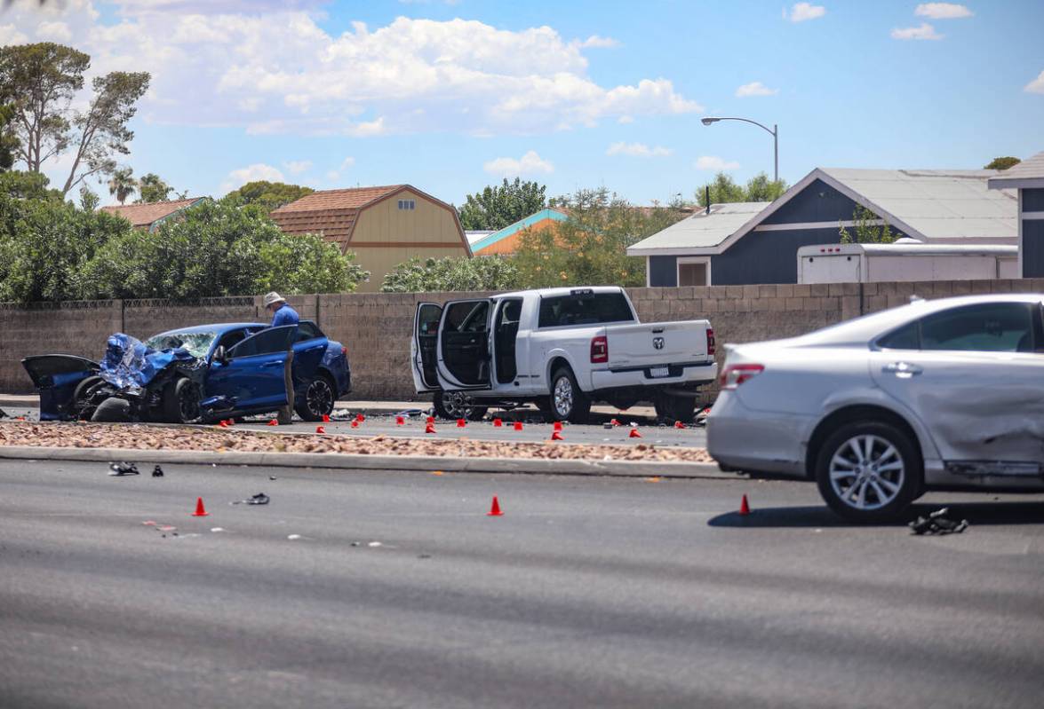 The Metropolitan Police Department investigates the scene of a fatal four vehicle crash on Sout ...