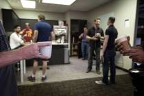 A group gathers for morning coffee at Work In Progress, 317 S. 6th Street, on Wednesday, Aug. 2 ...