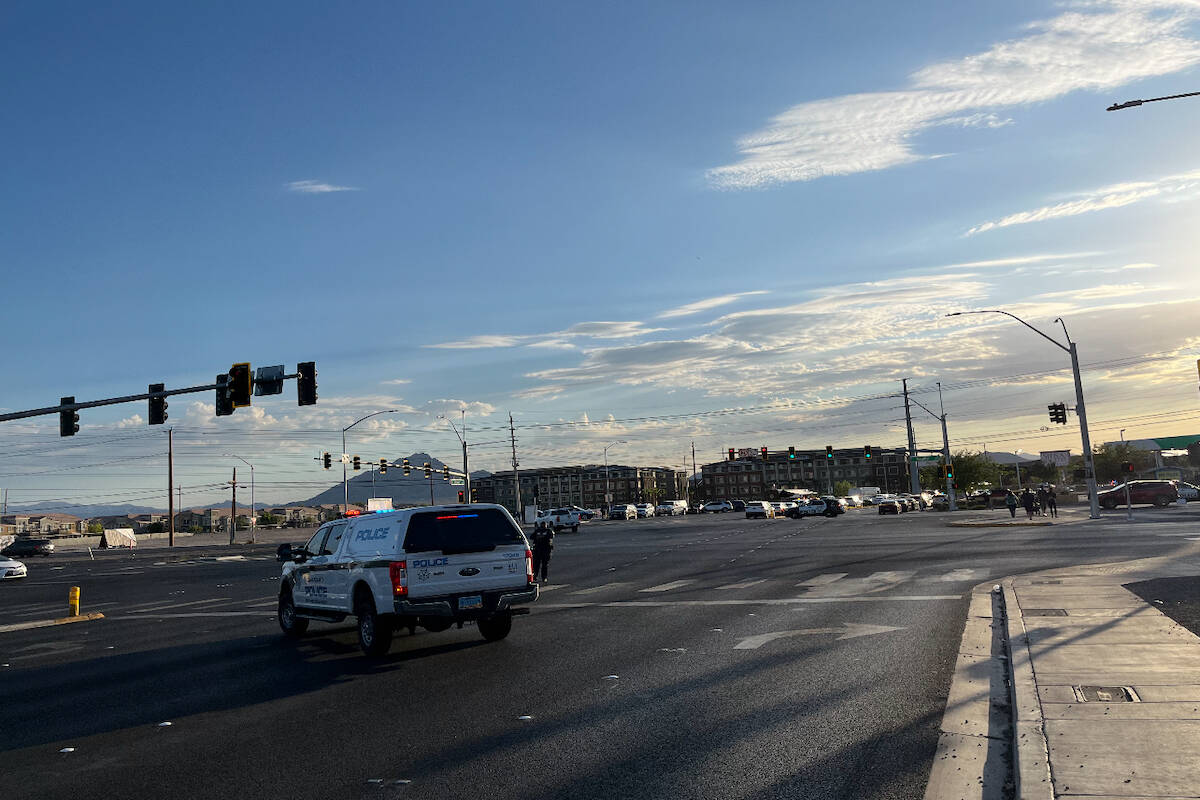 Police investigate a shooting involving officers in the 6400 block of Boulder Highway on Wednes ...