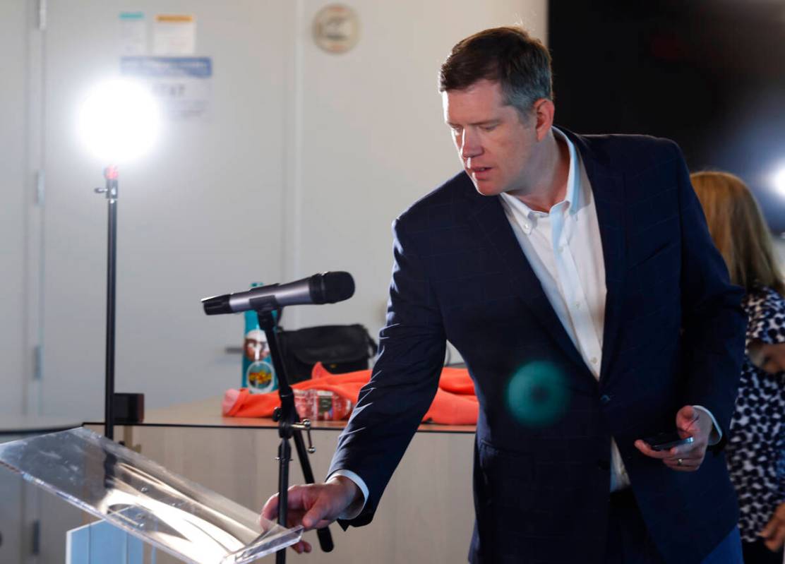 Environmental Defense Fund (EDF) Action President David Kieve adjusts the microphone as he take ...
