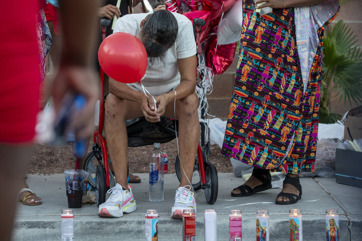 Kayla Harris’ grandmother mourns the loss of her granddaughter during a candlelight service a ...