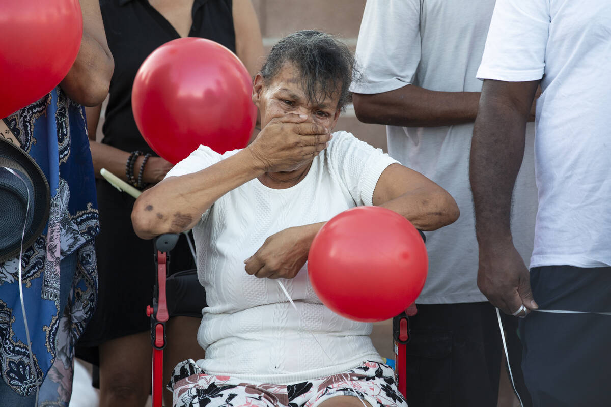 Kayla Harris’ grandmother mourns the loss of her granddaughter during a candlelight service a ...