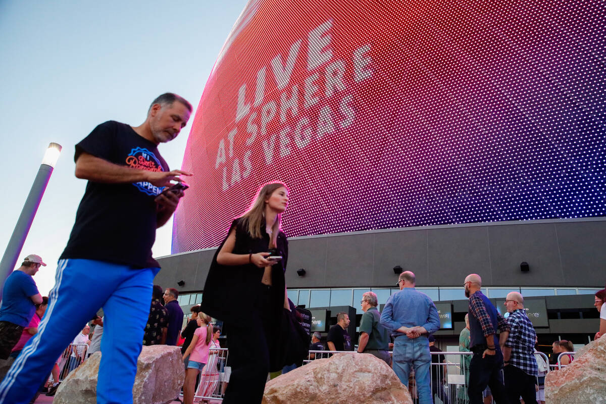 Excited fans wait outside of the Sphere on the night of its inaugural performance featuring U2 ...