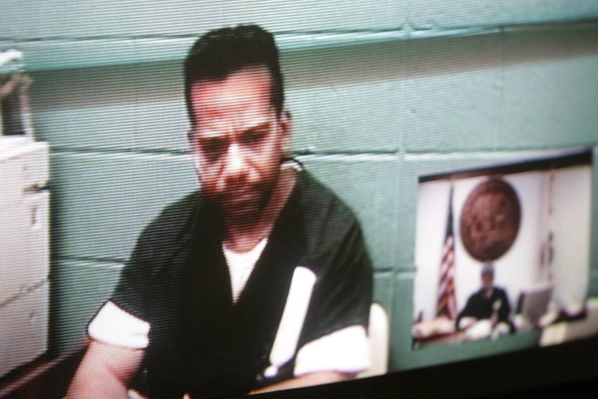 Former Nevada Assemblyman Steven Brooks is arraigned via videoconference in Judge John Gibson's ...