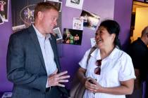 Clark County Sheriff Kevin McMahill visits with Minddie Lloyd during the inaugural meeting of t ...