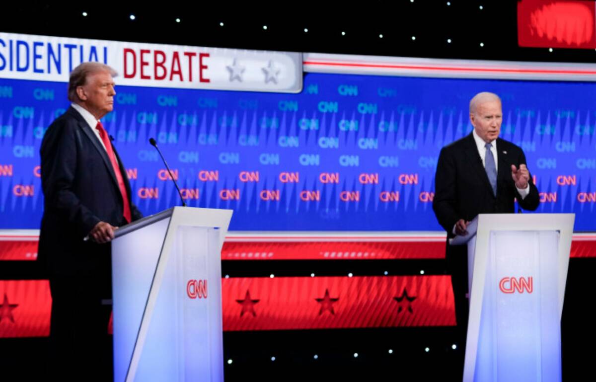 President Joe Biden, right, speaks as Republican presidential candidate former President Donald ...