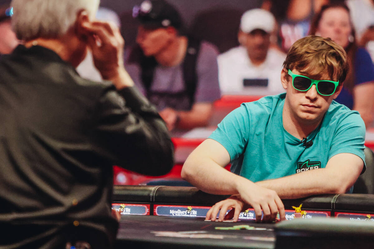 Professional poker player Chris Brewer competes during the final table of $50,000 buy-in during ...