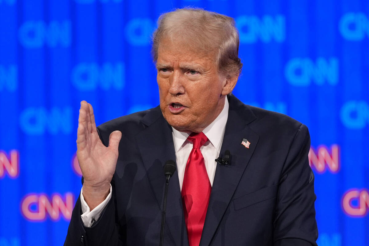 Donald Trump speaks during a presidential debate hosted by CNN with President Joe Biden, Thursd ...