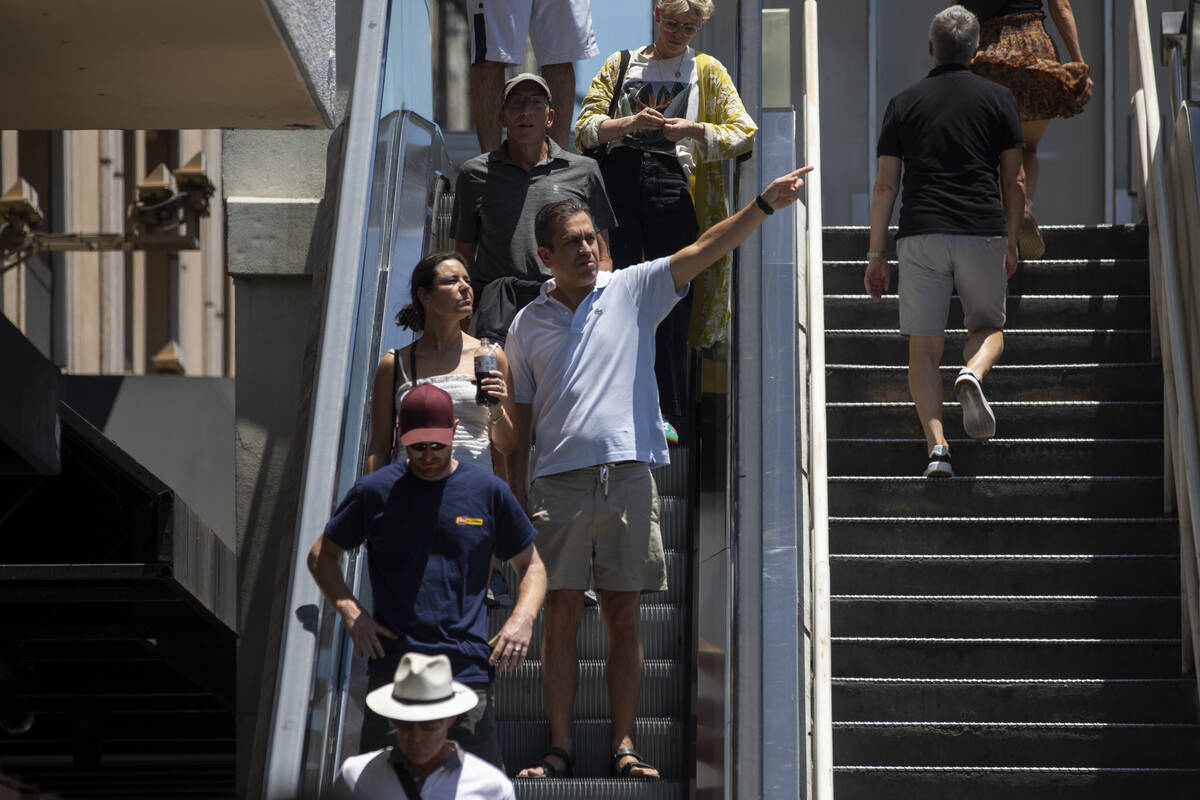 Tourists walk along the Strip, Thursday, June 27, 2024, in Las Vegas. (Daniel Jacobi II/Las Veg ...