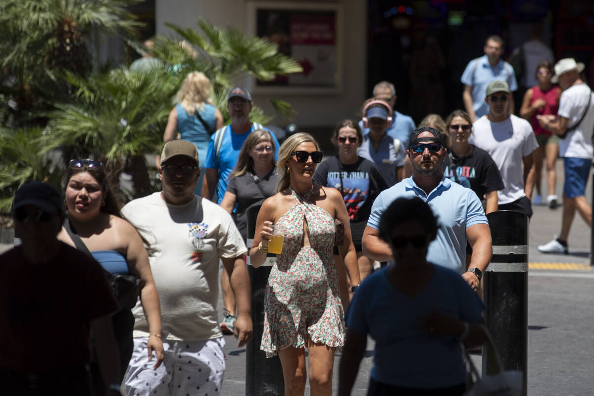 Tourists walk along the Strip, Thursday, June 27, 2024, in Las Vegas. (Daniel Jacobi II/Las Veg ...