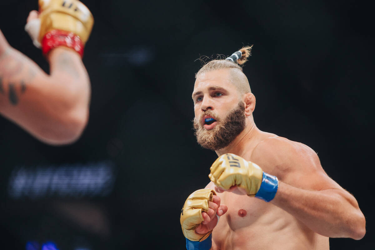Jiri Prochazka fights during the light heavyweight title bout at UFC 303 at T-Mobile Arena on S ...
