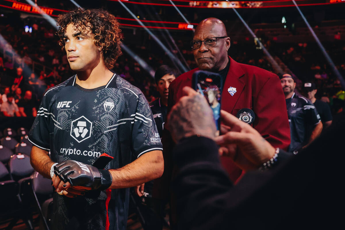 Payton Talbot walks out of the cage after knocking out his opponent, Yanis Ghemmouri, within th ...