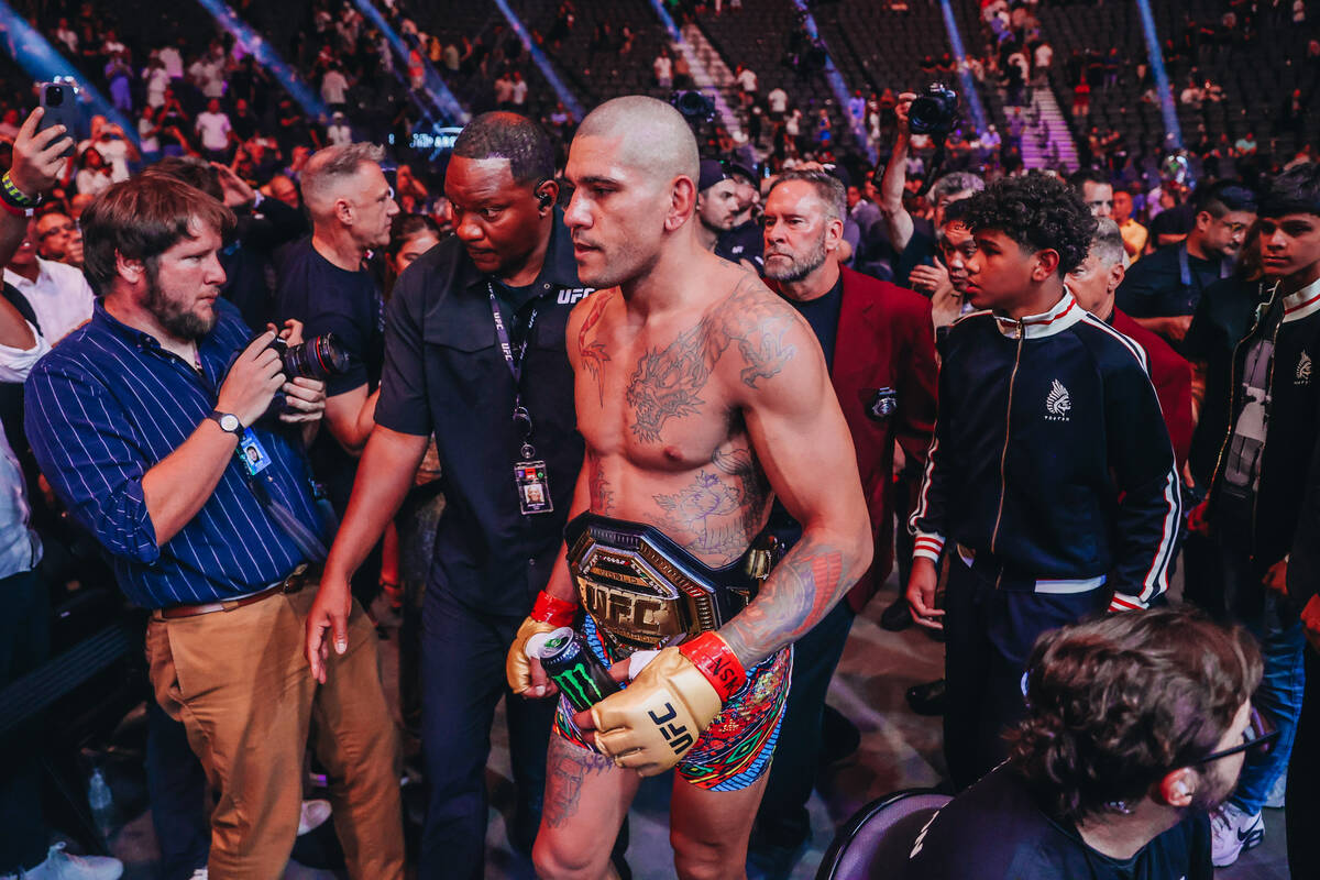Alex Pereira exists the cage after winning the light heavyweight title bout at UFC 303 at T-Mob ...