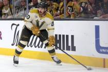 Golden Knights center Chandler Stephenson (20) skates with the puck during the third period of ...