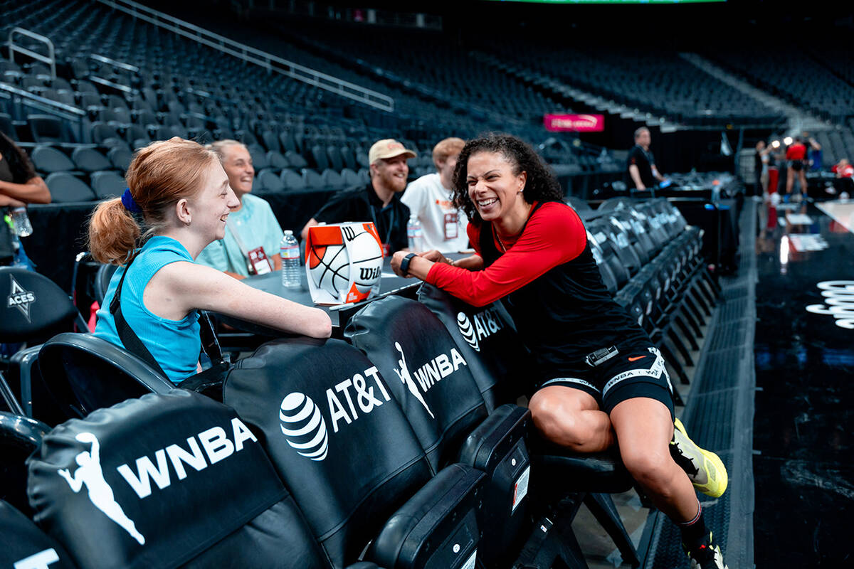 Las Vegas Aces veteran Alysha Clark sits down to talk to Bailey Lux during practice Monday, Jul ...