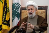 Hezbollah's deputy leader Sheik Naim Kassem, speaks during an interview with The Associated Pre ...